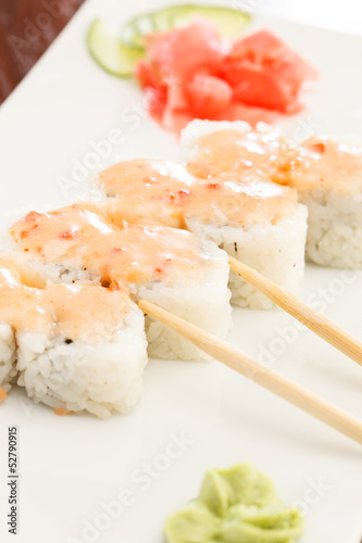 sushi with chopsticks