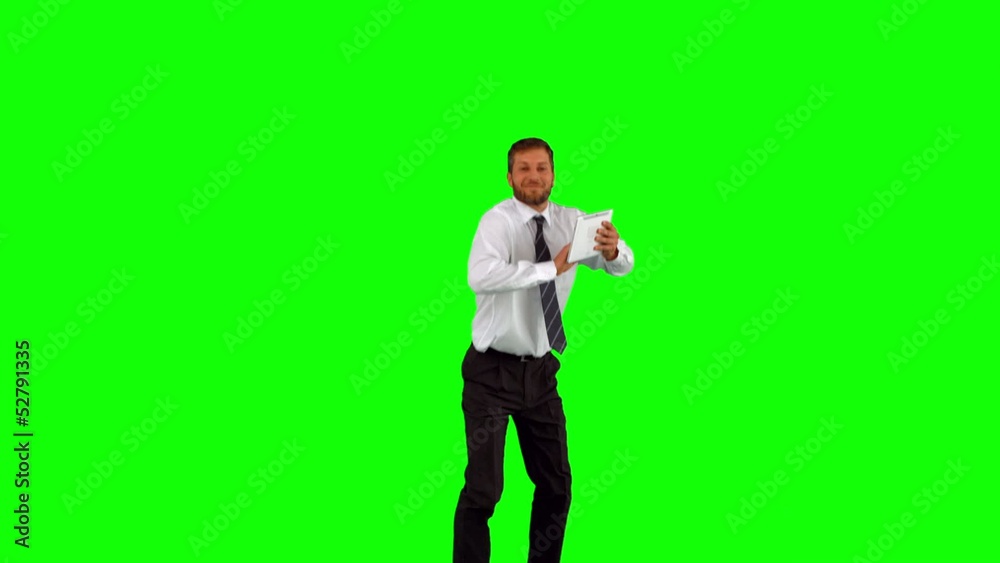 Businessman holding tablet pc jumping Businessman holding tablet pc jumping