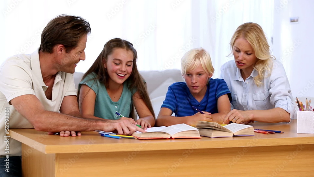 Parents doing homework with their children