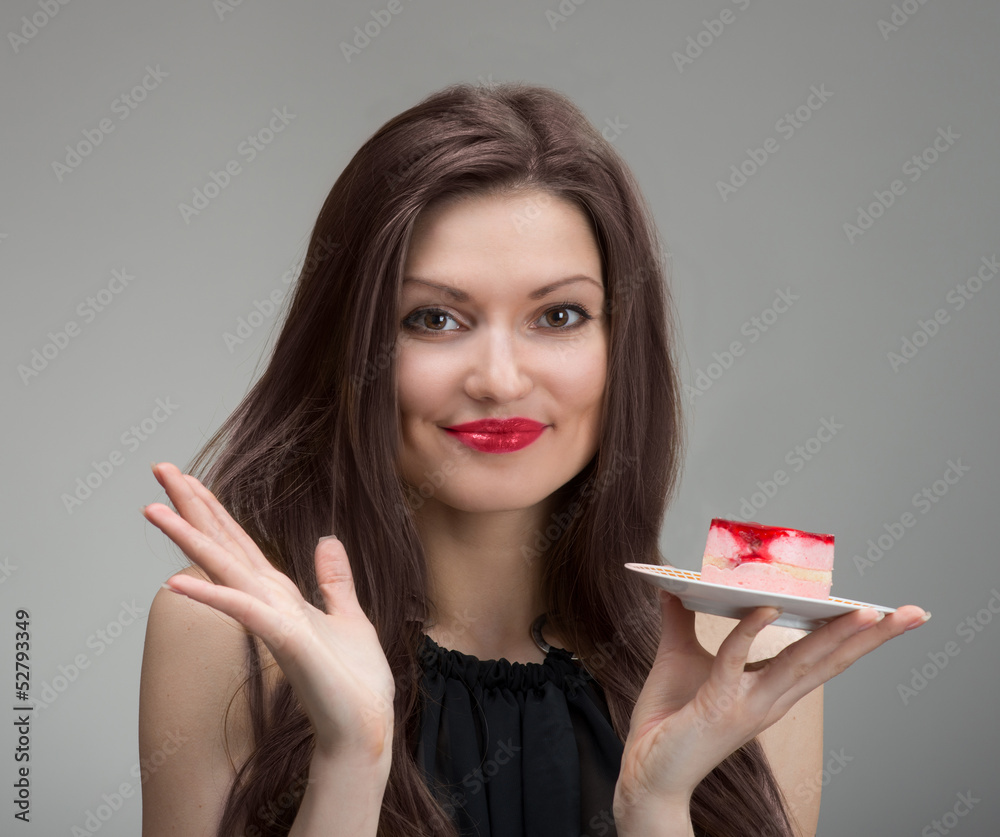 Smiling pretty woman with the cake, closeup portrait Smiling pretty woman with the cake, closeup portrait