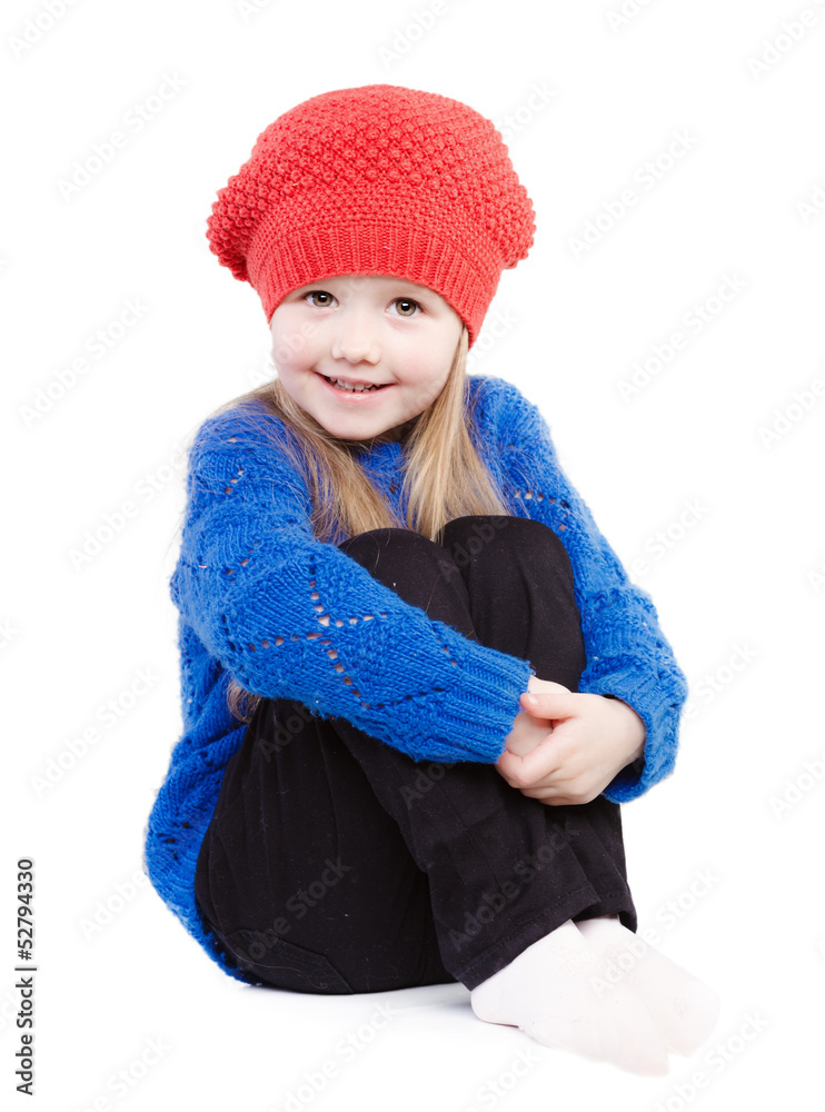 little girl in a red cap smiles, isolation on white little girl in a red cap smiles, isolation on white
