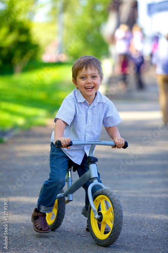 Little boy on a bicycle © Max Topchii