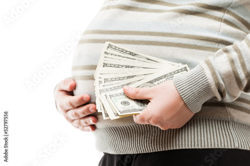 Pregnant woman holding dollar currency cash photo