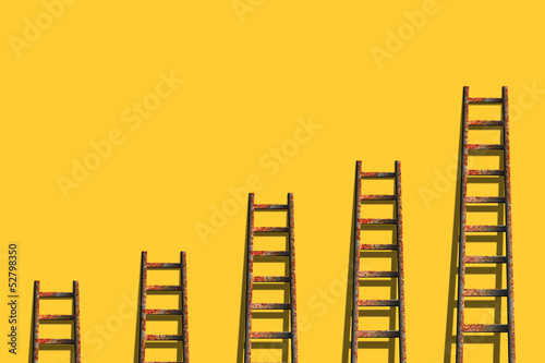 ladders on yellow wall ,competition concept