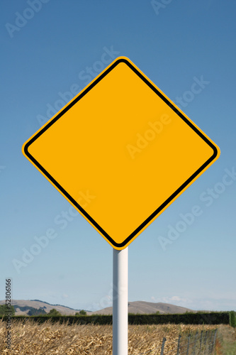 Blank yellow diamond road sign