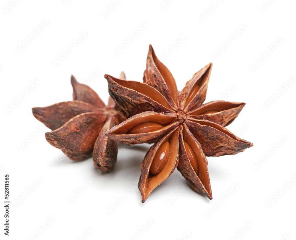 two whole star anise isolated on white background