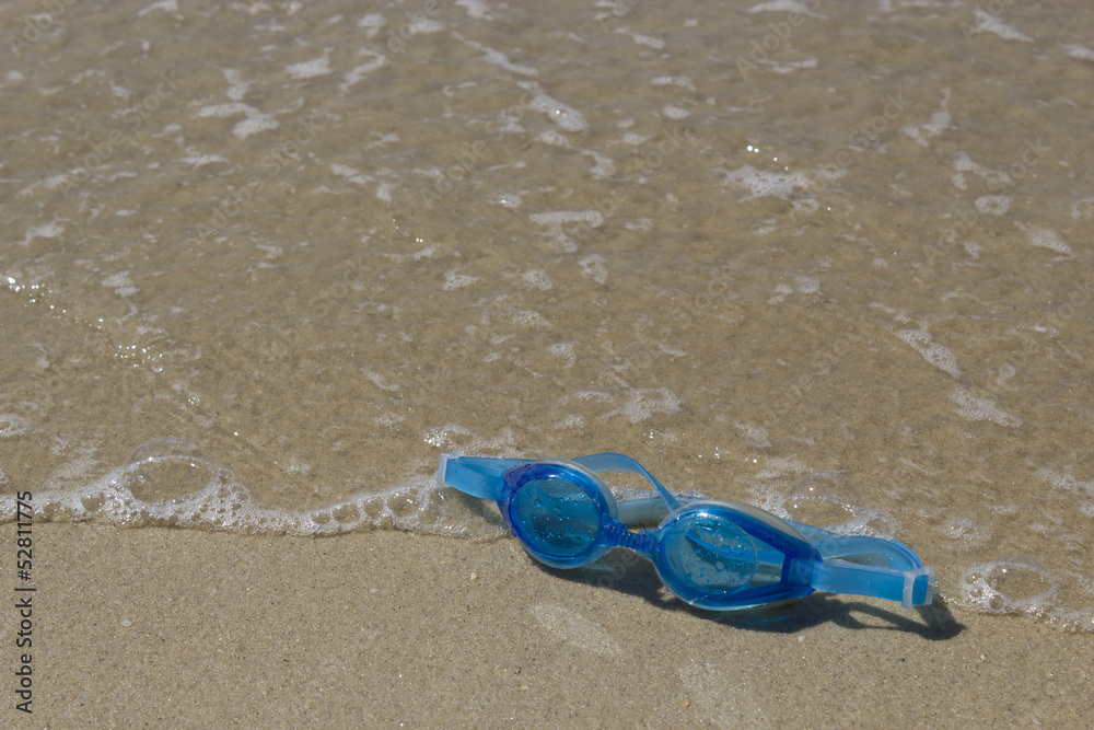 Swimming goggles wet with seawater Swimming goggles wet with seawater