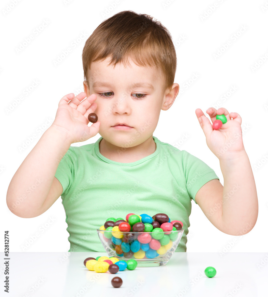 Portrait of a boy with candies Portrait of a boy with candies