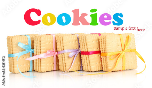 Sweet cookies tied with colorful ribbons isolated on white