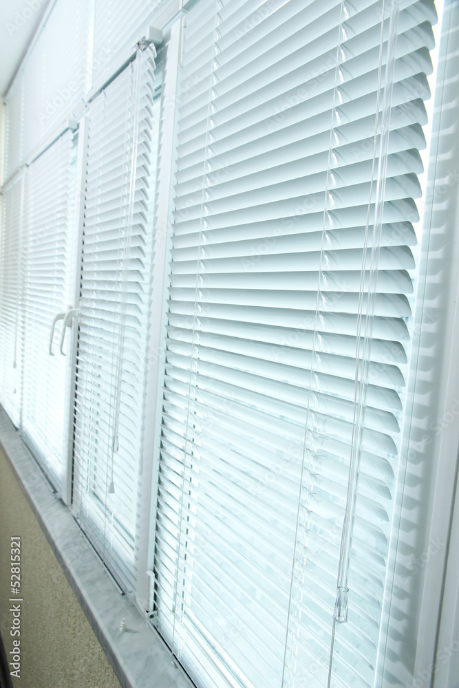 Obraz premium Balcony windows with shutters