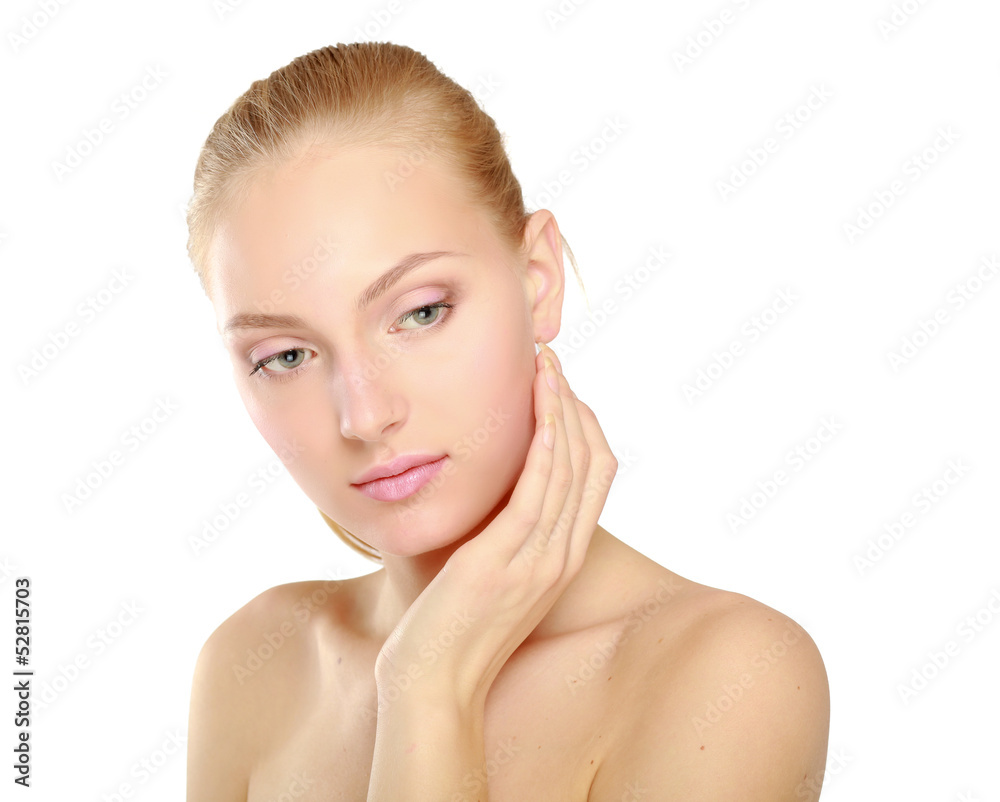 A beautiful woman touching her face, portrait