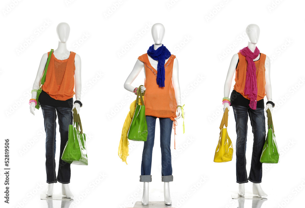 Obraz premium fashion dress with handbag and scarf on female three mannequin