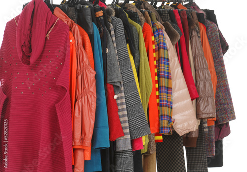 Set of female clothes Variety of hanging on clothes rack