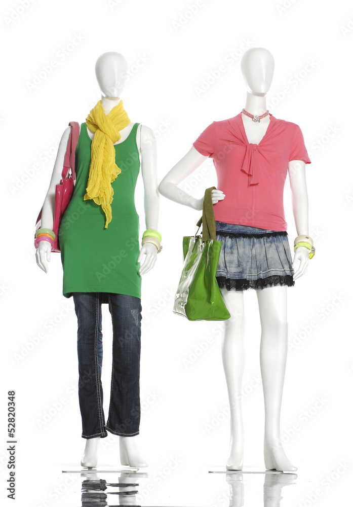 fashion dress with handbag and scarf on female on two mannequin