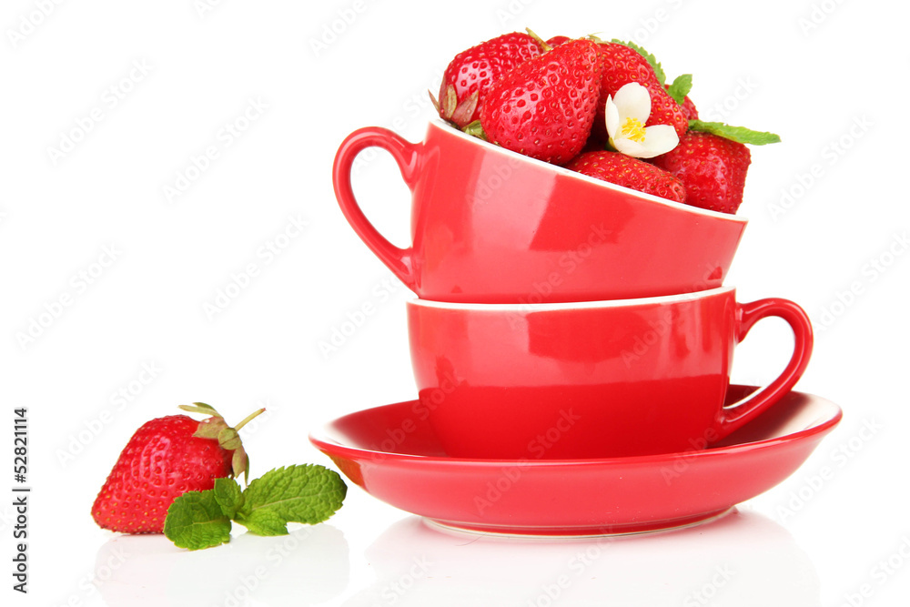 Ripe sweet strawberries in red cups, isolated on white Ripe sweet strawberries in red cups, isolated on white