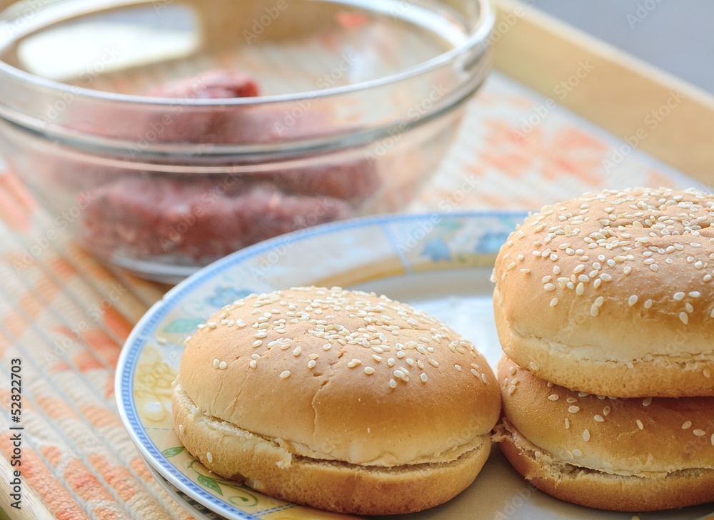 Three fresh buns prepared for the meat - hamburger.