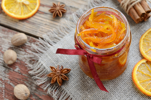 Fototapeta Naklejka Na Ścianę i Meble -  Homemade candied peels orange jam in glass jar