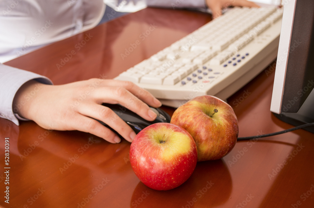 custom made wallpaper toronto digitalHuman hands working on a computer and two apples to eat
