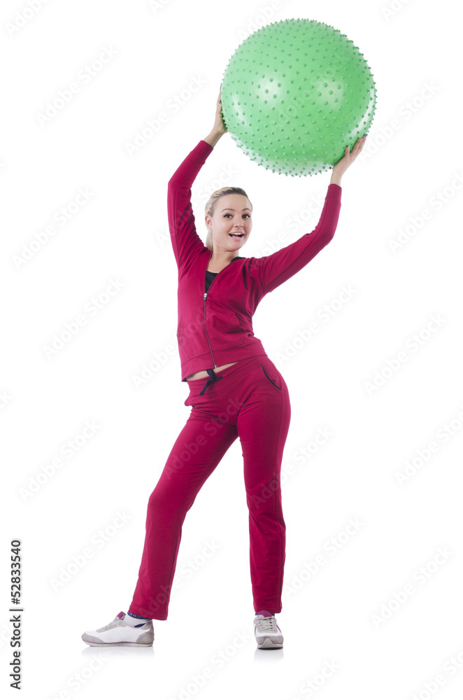 Young woman with ball exercising on whitee Young woman with ball exercising on whitee
