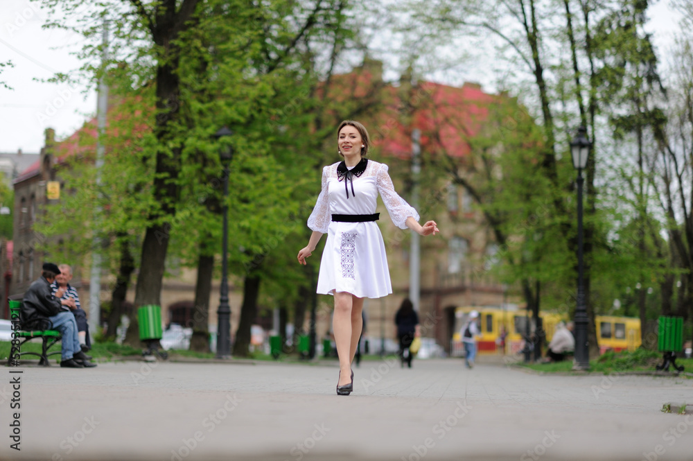 Happy girl running in the park