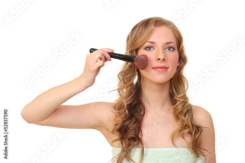 beautiful woman with a brush.on a white background