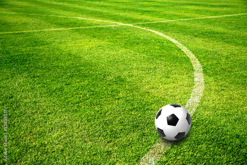 a ball on beautiful football field a ball on beautiful football field