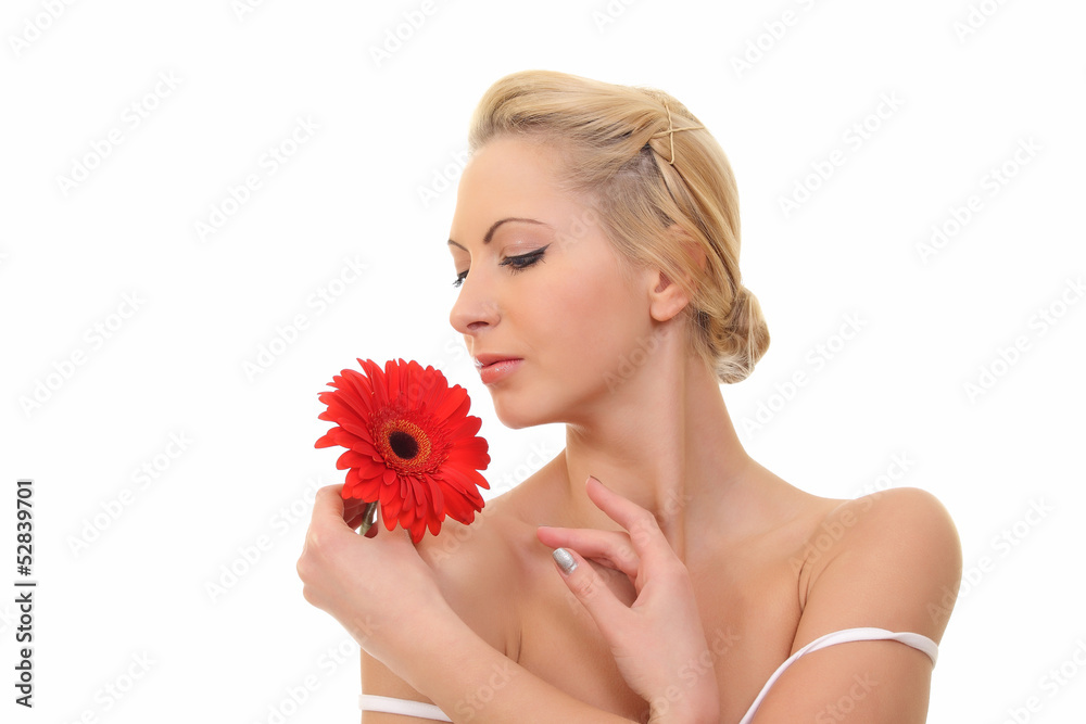 beautiful young woman with red gerberas