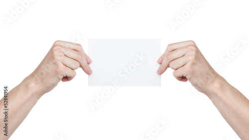 two adult man hands holding blank paper sheet