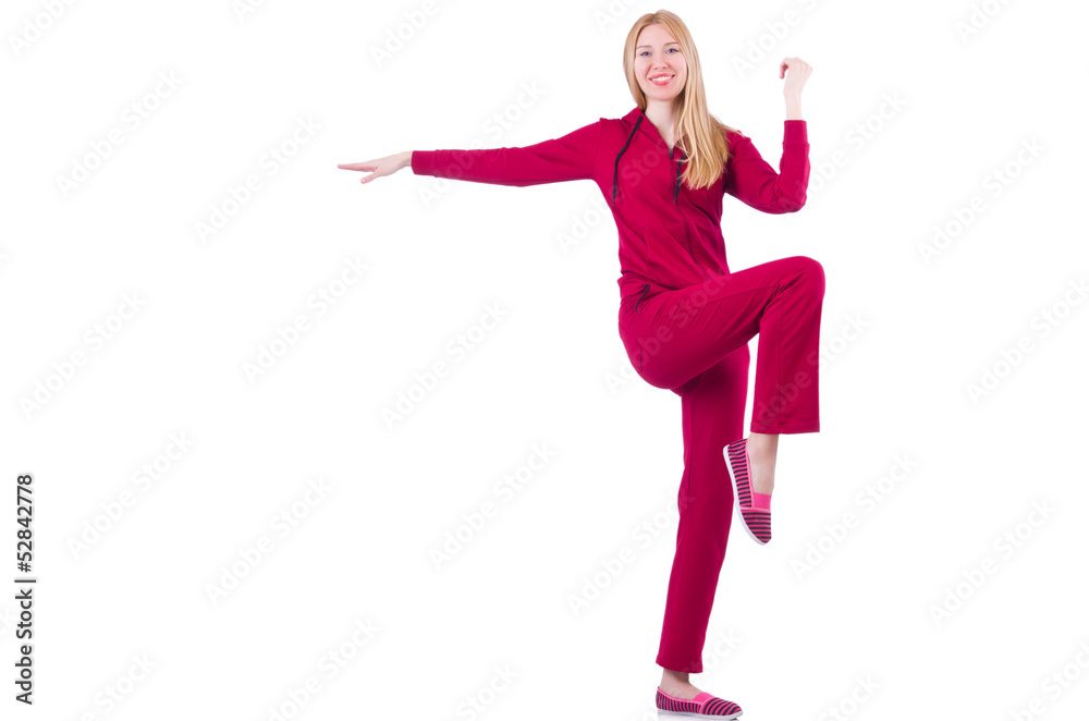 Fototapeta premium Young woman doing exercises on white