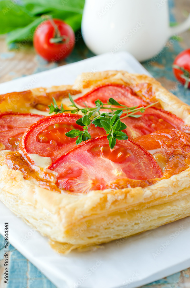 Pie with tomatoes and cheese . Selective focus Pie with tomatoes and cheese . Selective focus