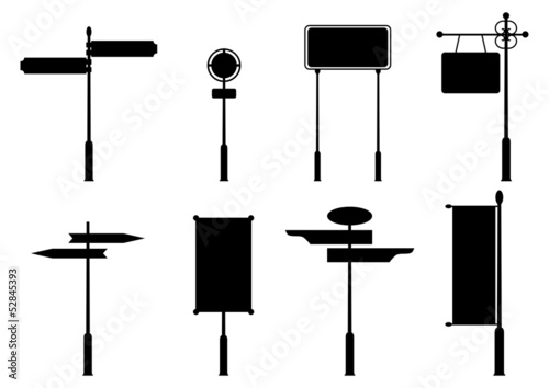 Silhouettes of vintage road signs.