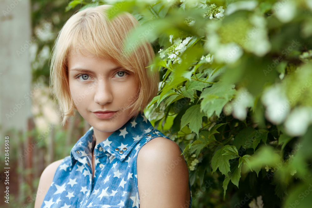 Portrait of beautiful young girl outdoors in summer Portrait of beautiful young girl outdoors in summer
