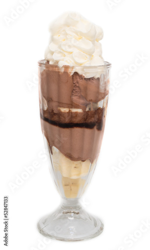 A delicious chocolate ice cream sundae isolated on white