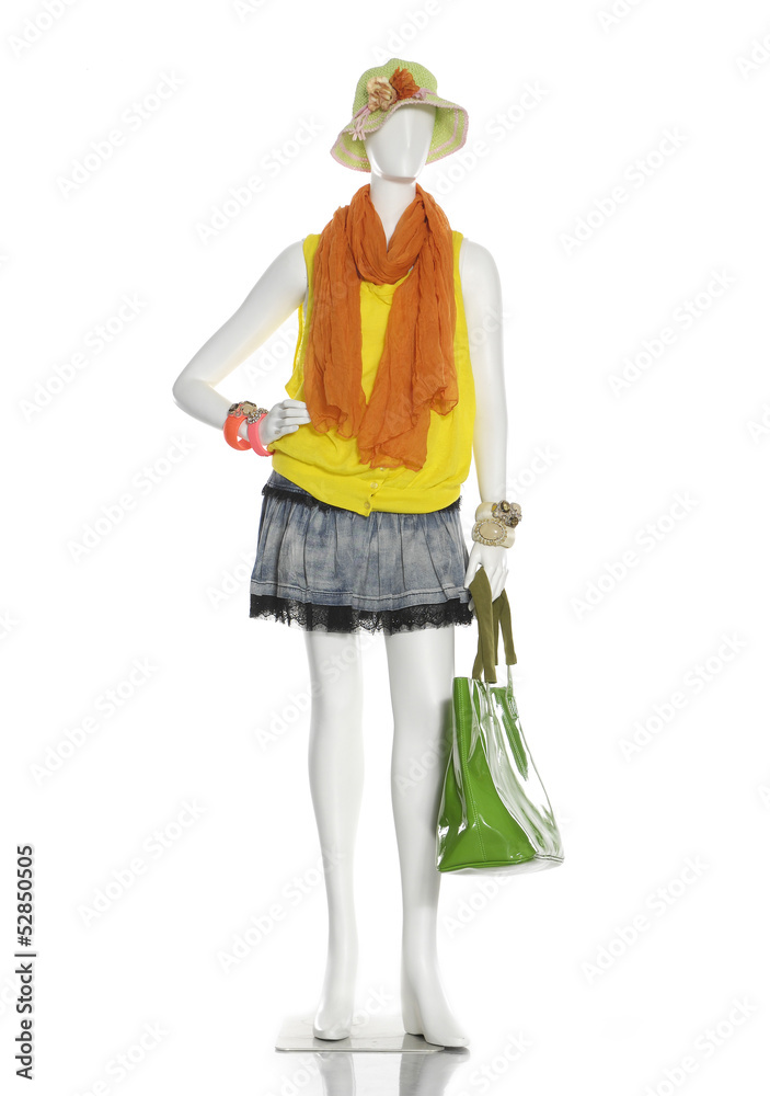 Obraz premium female clothes in scarf with hat ,bag on a mannequin