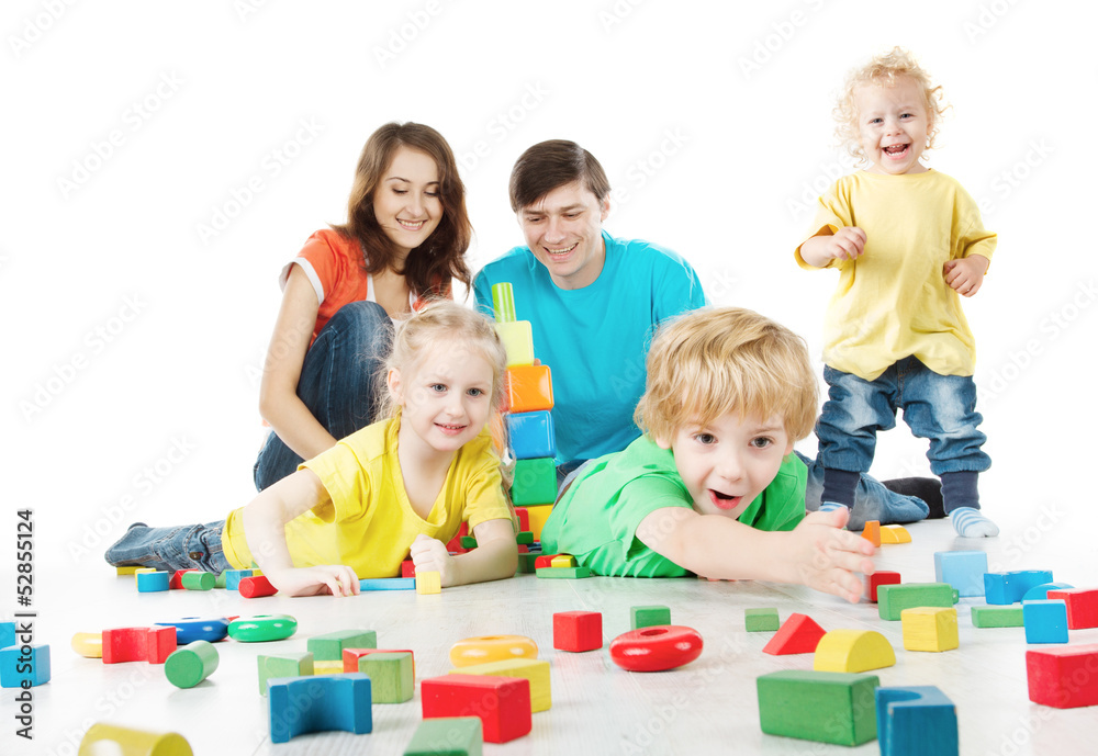 Happy family. Parents, three kids playing blocks toys Happy family. Parents, three kids playing blocks toys