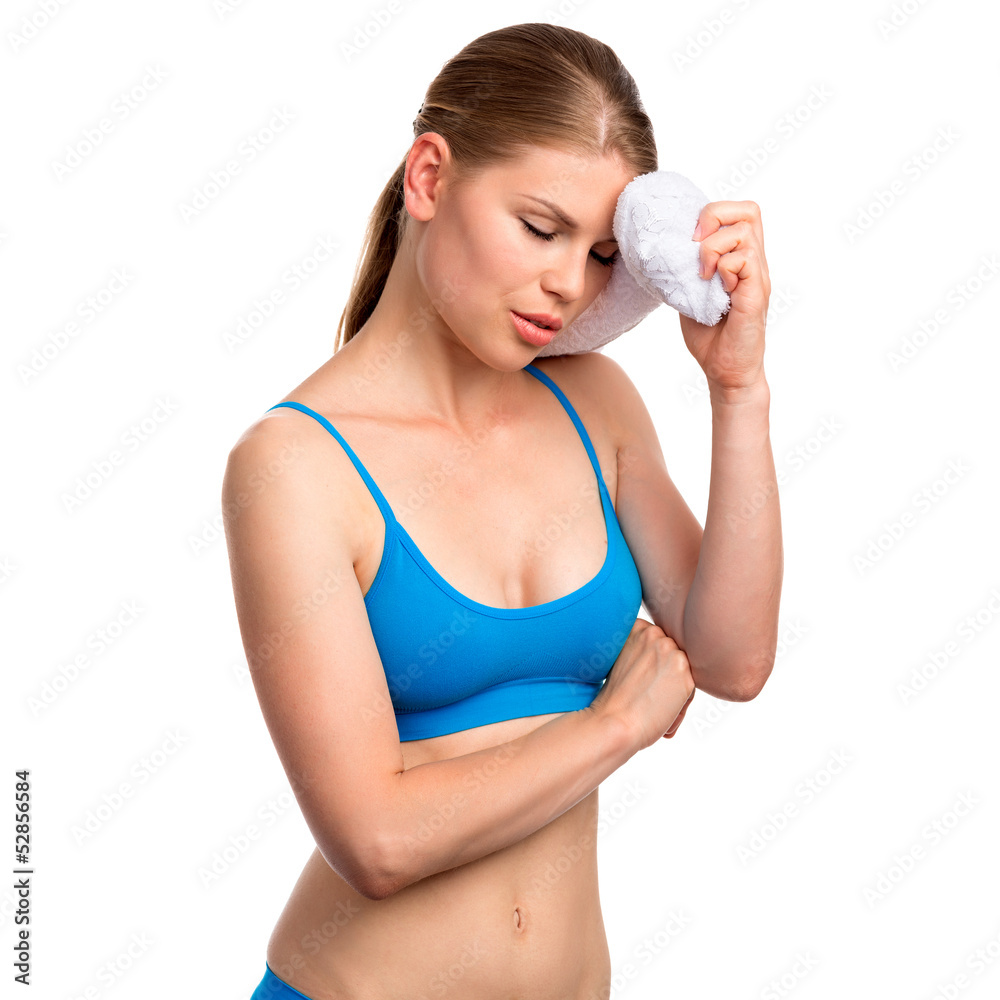 Exhausted girl after fitness activity holding towel, isolated Exhausted girl after fitness activity holding towel, isolated