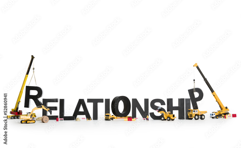 Developing a relationship: Machines building word. - obrazy, fototapety, plakaty 