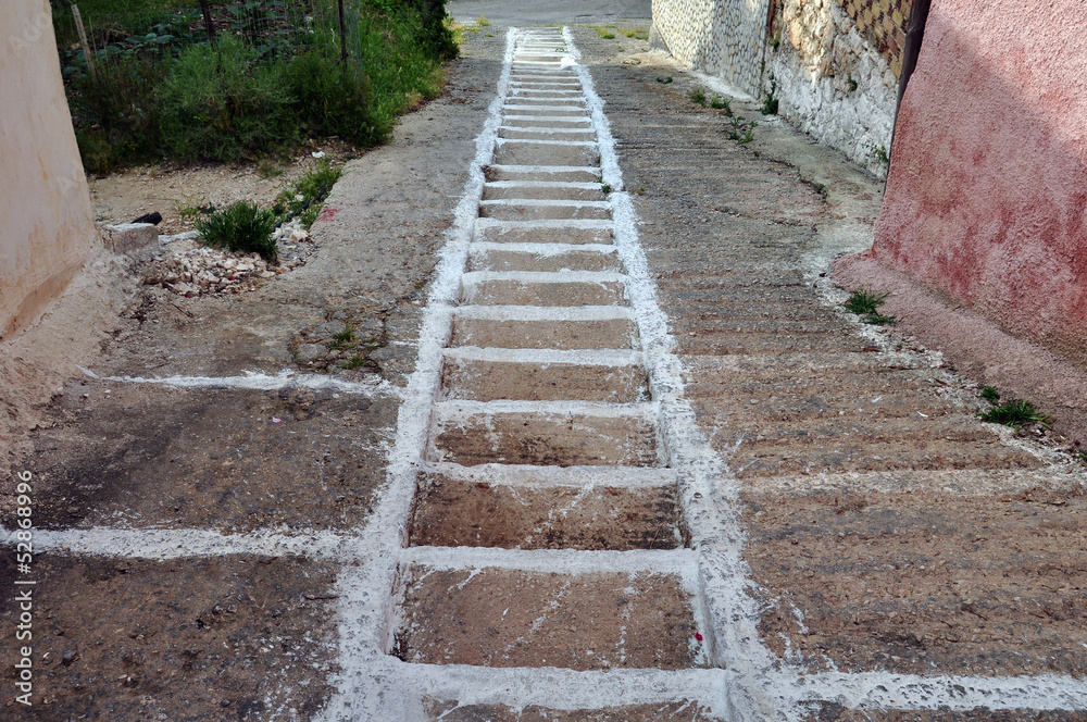 sloped alley white painted steps sloped alley white painted steps