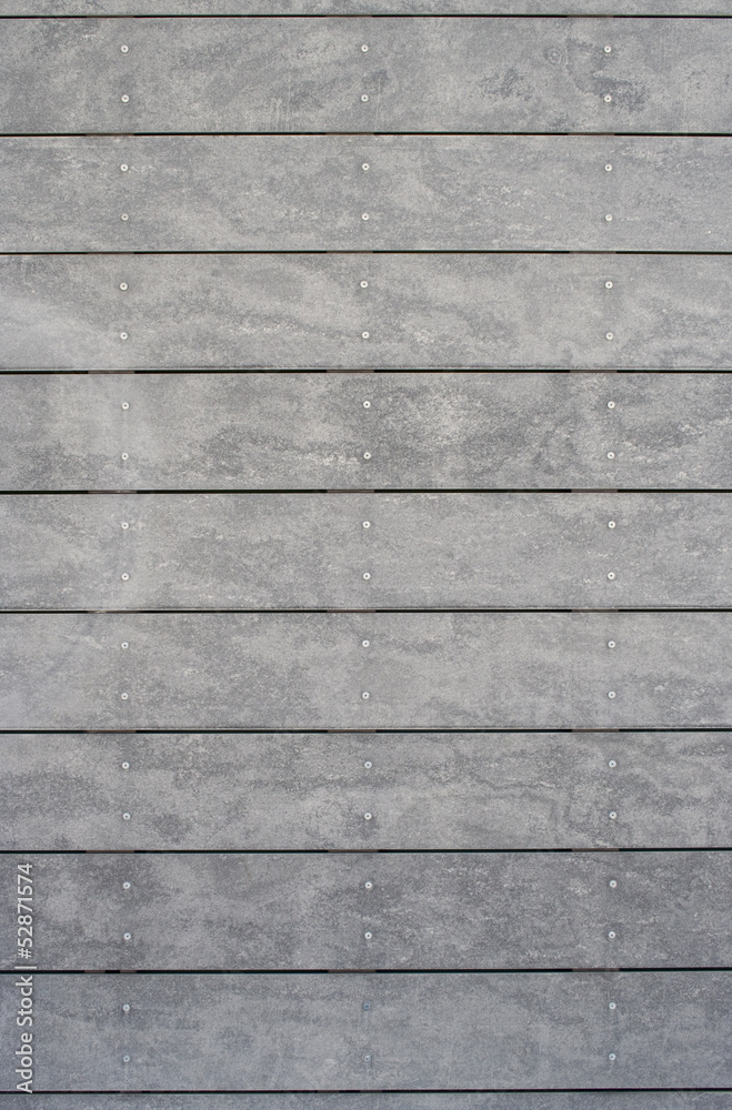 Naklejka premium Grey panelling with metal rivets