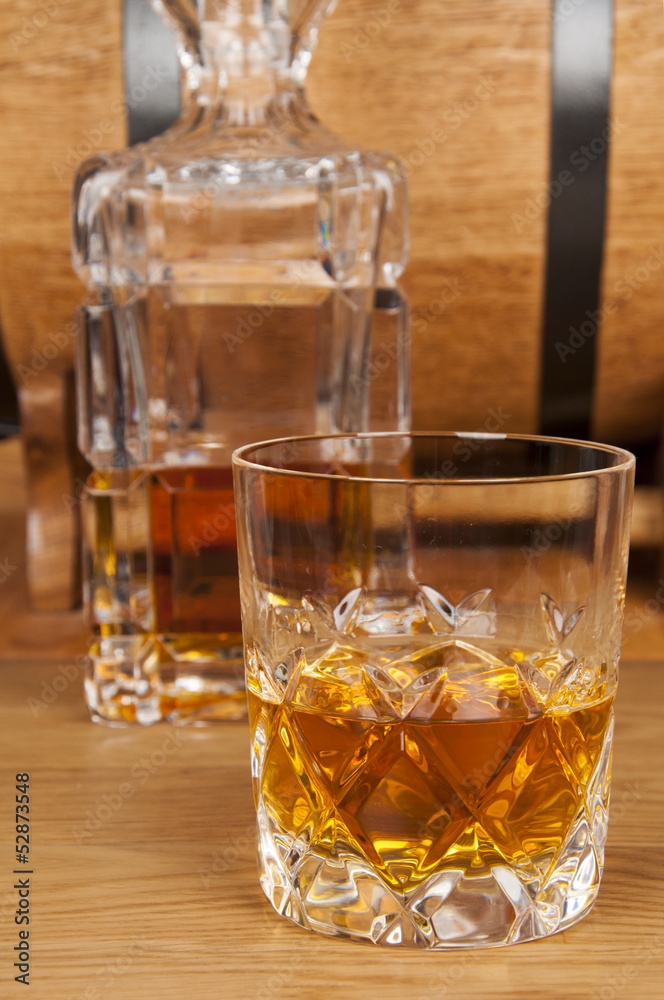 glass of whiskey and barrel glass of whiskey and barrel