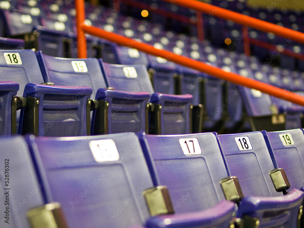 Fototapeta premium Blue Folding Seats at an Indoor Sports Arena