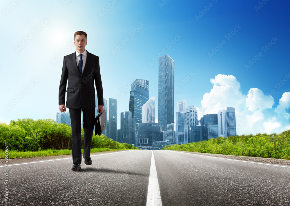 business man walking on the road business man walking on the road