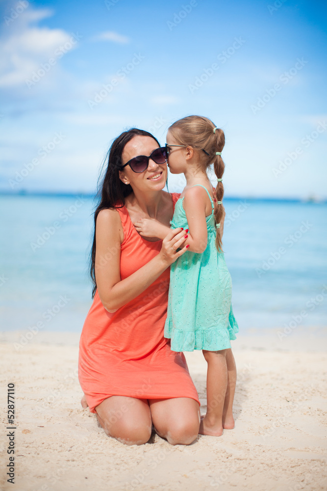 Young beautiful mother and her adorable little daughter at Young beautiful mother and her adorable little daughter at