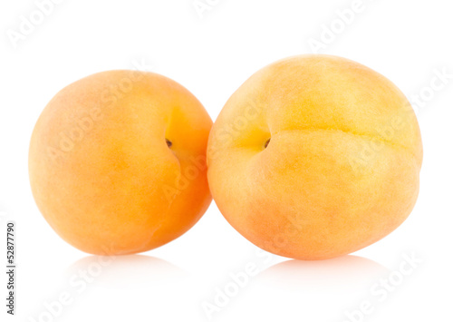 ripe apricots isolated on white background
