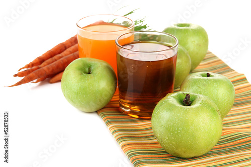 Glasses of juice, apples and carrots, isolated on white