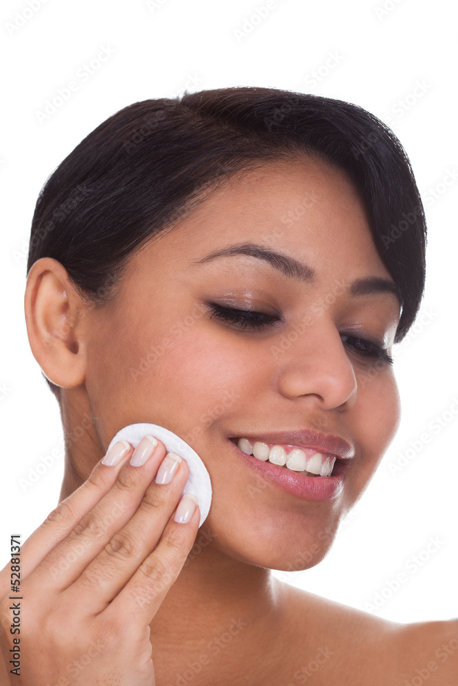 Young Woman Wiping Face With A Pad