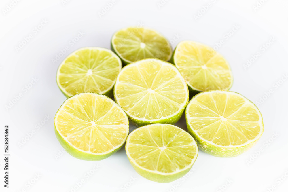 Half portion citrus lime slice on white background