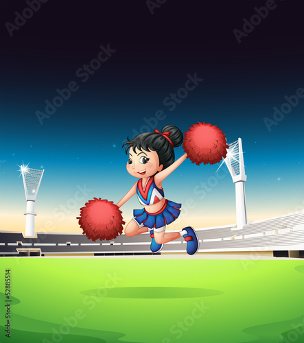 A cheerleader cheering on the field