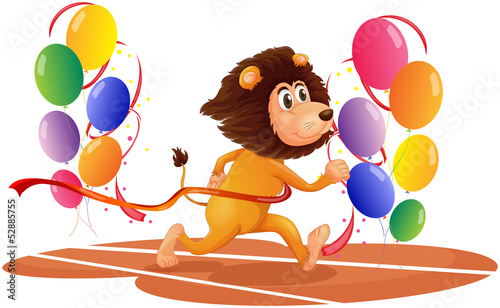 A lion running with colorful balloons