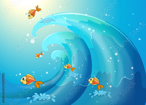 Fishes dancing along the big waves